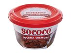 A tub of creamy coconut candy, with a red lid and label featuring the text 'SOCOCO COCADA CREMOSA'.