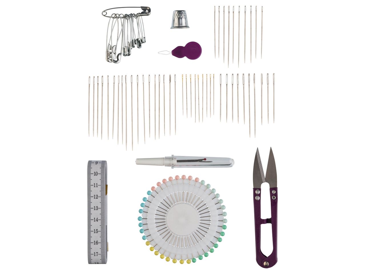 A collection of sewing tools including safety pins, needles, a thimble, a measuring tape, and scissors.