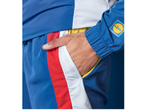 Roupa desportiva Lidl: fato de treino azul com riscas vermelhas e brancas.