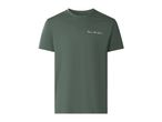 Dark green short-sleeved t-shirt with the text 'Thrive in the unknown' on the chest.