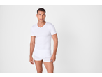 Man in white v-neck undershirt and boxer briefs