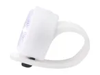 White bicycle light with a flexible silicone strap, illuminated.