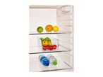 Open refrigerator with fresh fruits, vegetables in a clear container, and two water bottles.