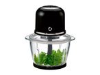 Electric food chopper with fresh parsley inside a glass bowl