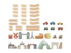 Wooden toy set with train tracks, cars, buildings, and landscape elements.
