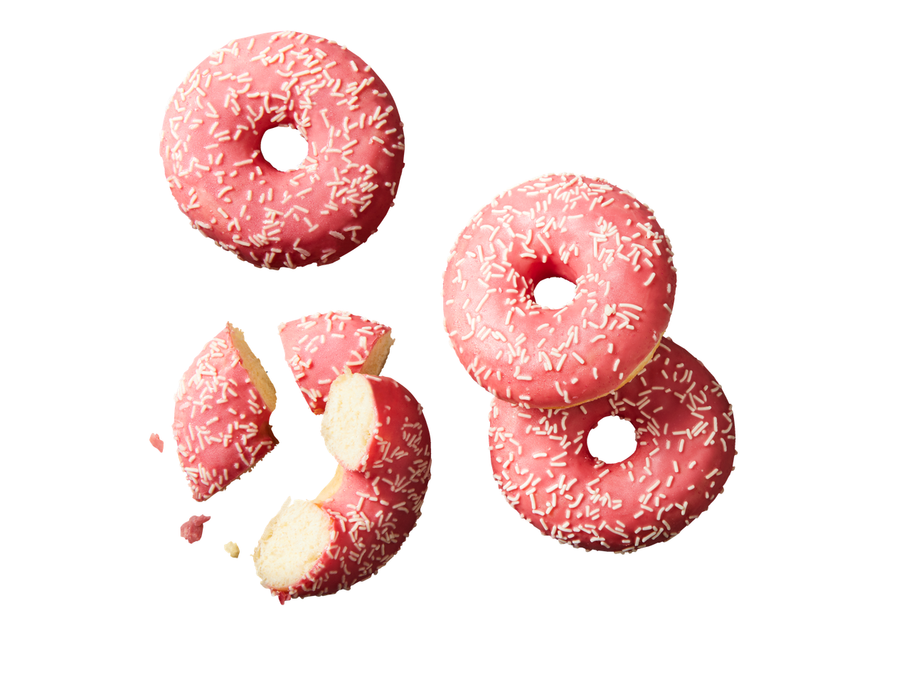 Розови понички с поръска, някои цели и една счупена.