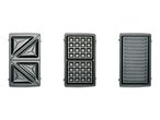 Three interchangeable plates for a sandwich maker: toast, waffle, and grill plates.
