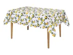 White tablecloth with a vibrant lemon and green leaf pattern on a wooden table.