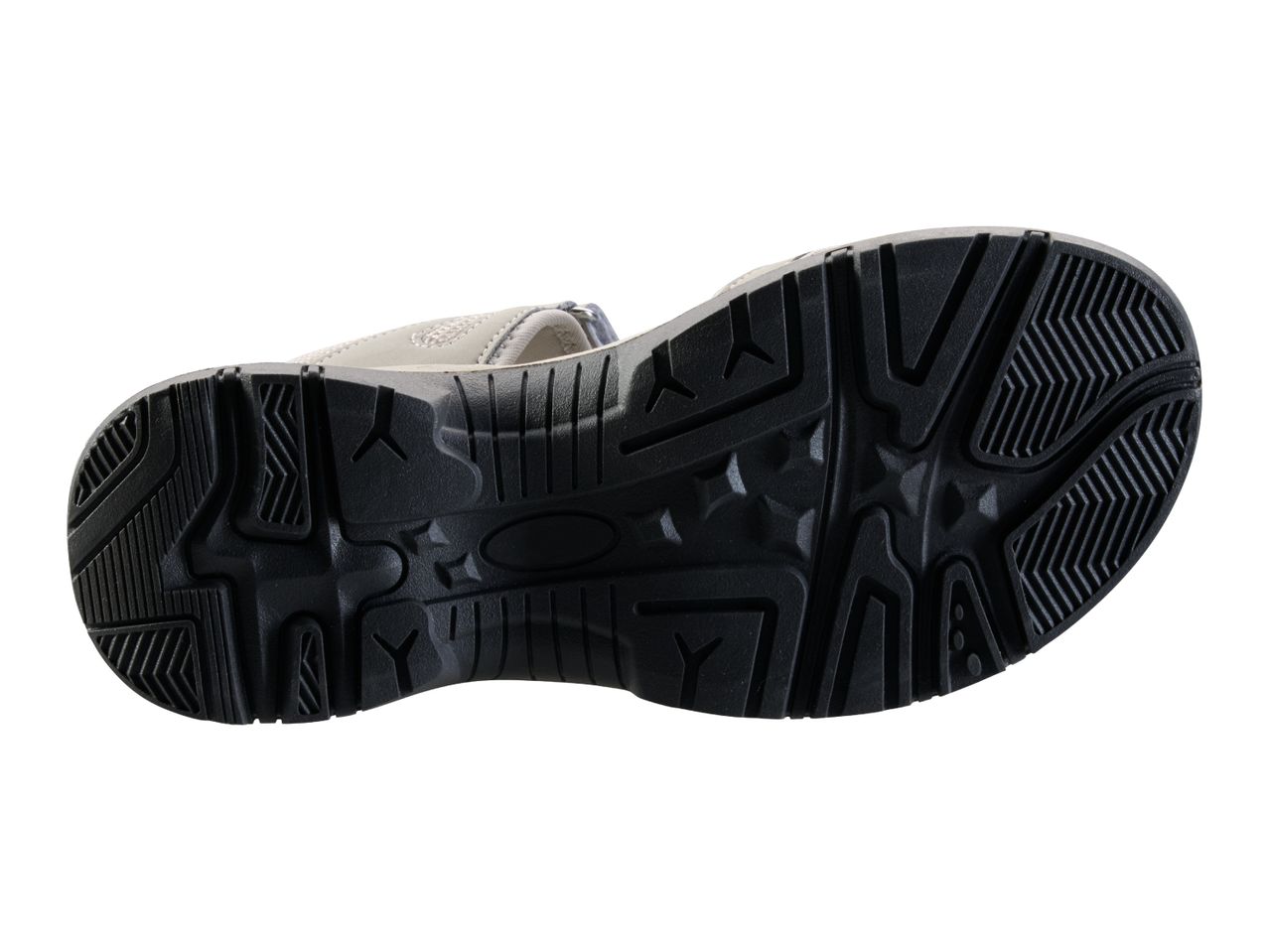 Bottom view of a black and grey sandal sole with a textured pattern for grip.