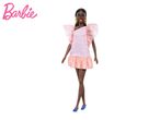 Barbie doll in a pink dress and blue shoes.