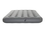 Grey inflatable air mattress with a textured top surface and an inflation valve on the side.