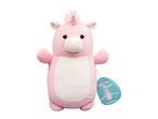 Pink unicorn plush toy with a white belly and a tag that says 'Seraphina'