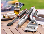Stainless steel BBQ brush, tongs, and spatula.