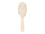 Beige hairbrush with a unique S-shaped bristle pattern on a white background.