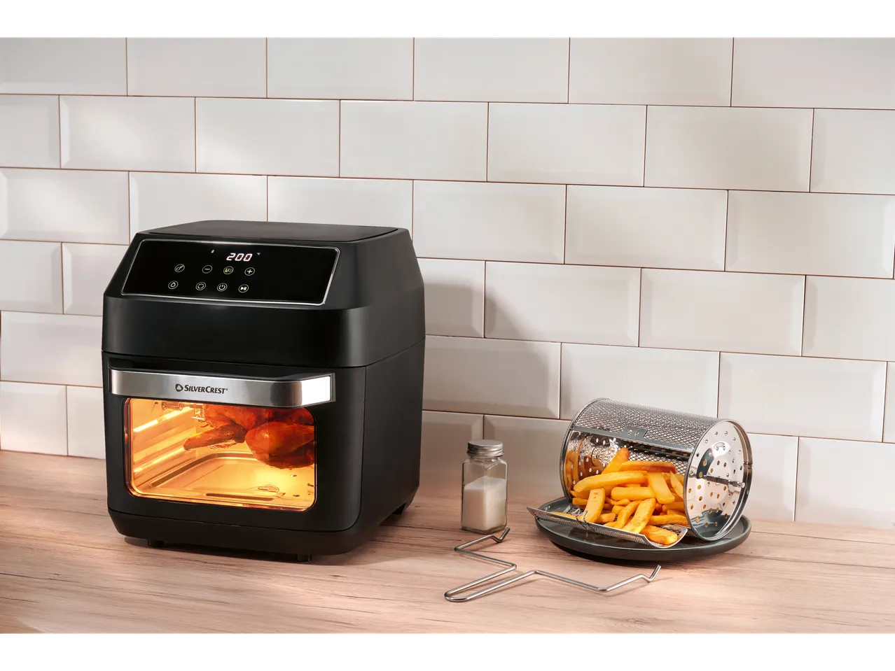 SilverCrest air fryer, french fries, and roasted chicken.
