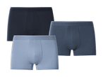 Tre par herreboxershorts i mørkeblå, blå og lyseblå.