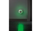 LIVARNO home LED Night Light illuminating a wall and floor with green light.