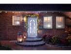 Livarno home LED light chain decorates a house entrance at night.