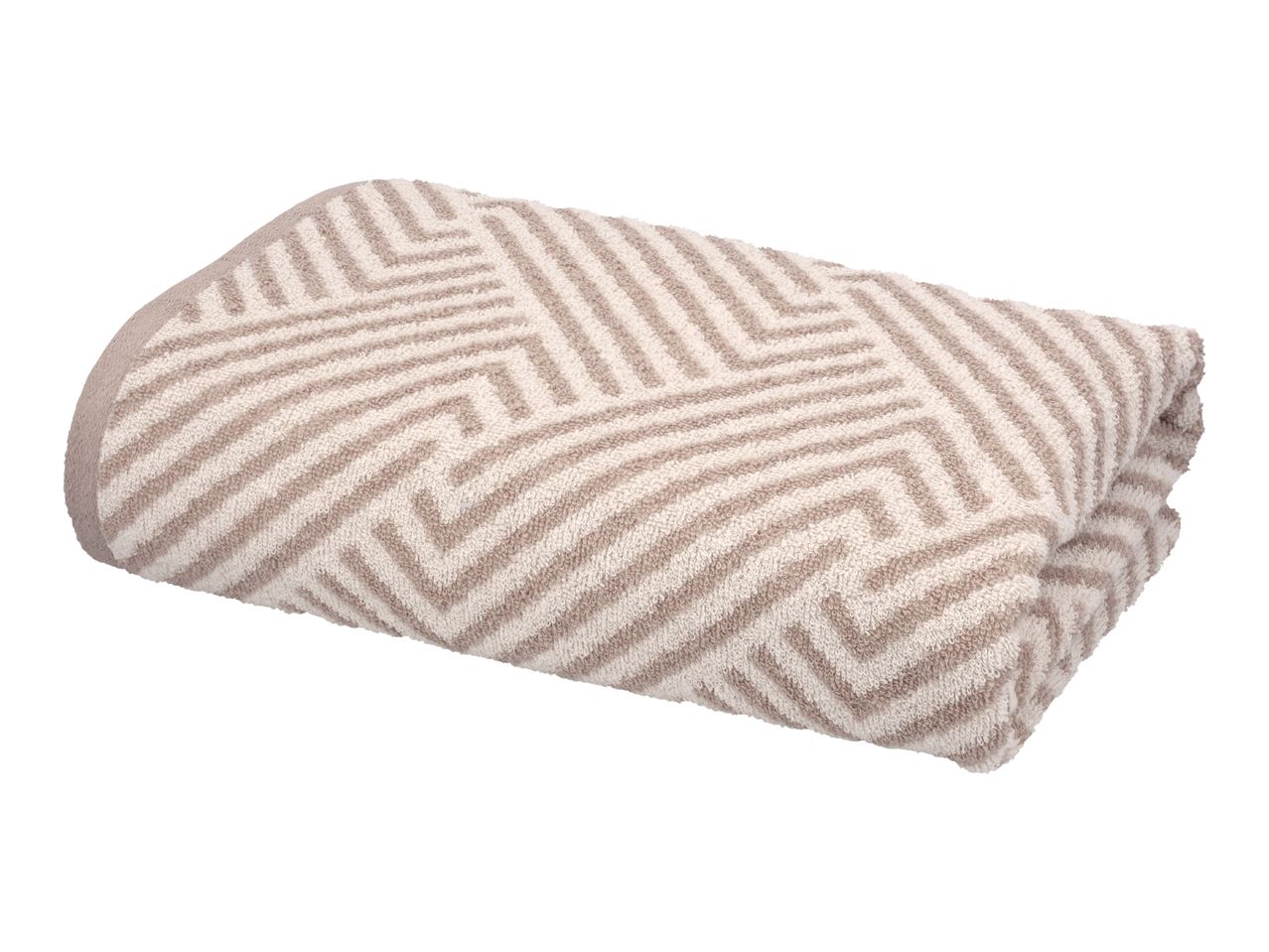 Folded beige and white patterned towel