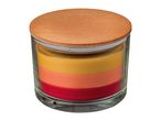 Layered candle in a glass jar with a wooden lid, featuring red, orange, and yellow wax.