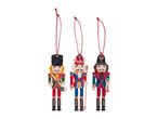 Three colorful nutcracker Christmas tree ornaments with red hanging loops.