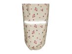 Cream-colored rain pants with pink floral print and a reflective stripe.