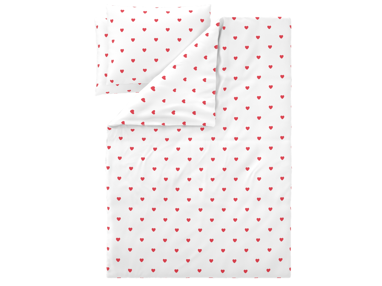 Бял плик за завивка и калъфка за възглавница с червени сърца, сгънати спретнато.