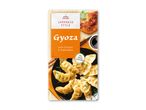 Pakke med japansk-inspirerede Gyoza med kylling og grøntsager, inklusive sojasauce.