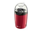 Red popcorn maker with a transparent lid and a black base, featuring a hot surface warning.