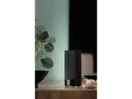 Difuzor de aromă cu ultrasunete LIVARNO home pe o masă de lemn cu plante și pietre.