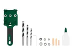 A green drilling jig with three drill bits, an Allen key, metal rings, wooden dowels, and a bottle of glue.