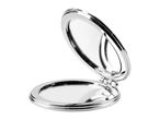 A silver compact mirror is open, showcasing its reflective surface.