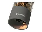 SilverCrest electric pepper grinder with mixed peppercorns and an illuminated base.
