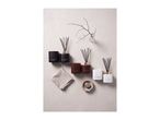 Scented candles and reed diffusers in Sandalwood & Oud, Wild Rose and White Musk.