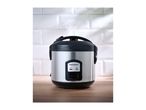 A stainless steel rice cooker releasing steam on a wooden countertop