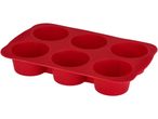 Red silicone muffin pan with six round cups