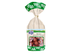 A bag of roasted and caramelised hazelnuts with a green and white floral design.