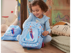 Frozen backpack and bag: A girl opens her new Disney backpack.