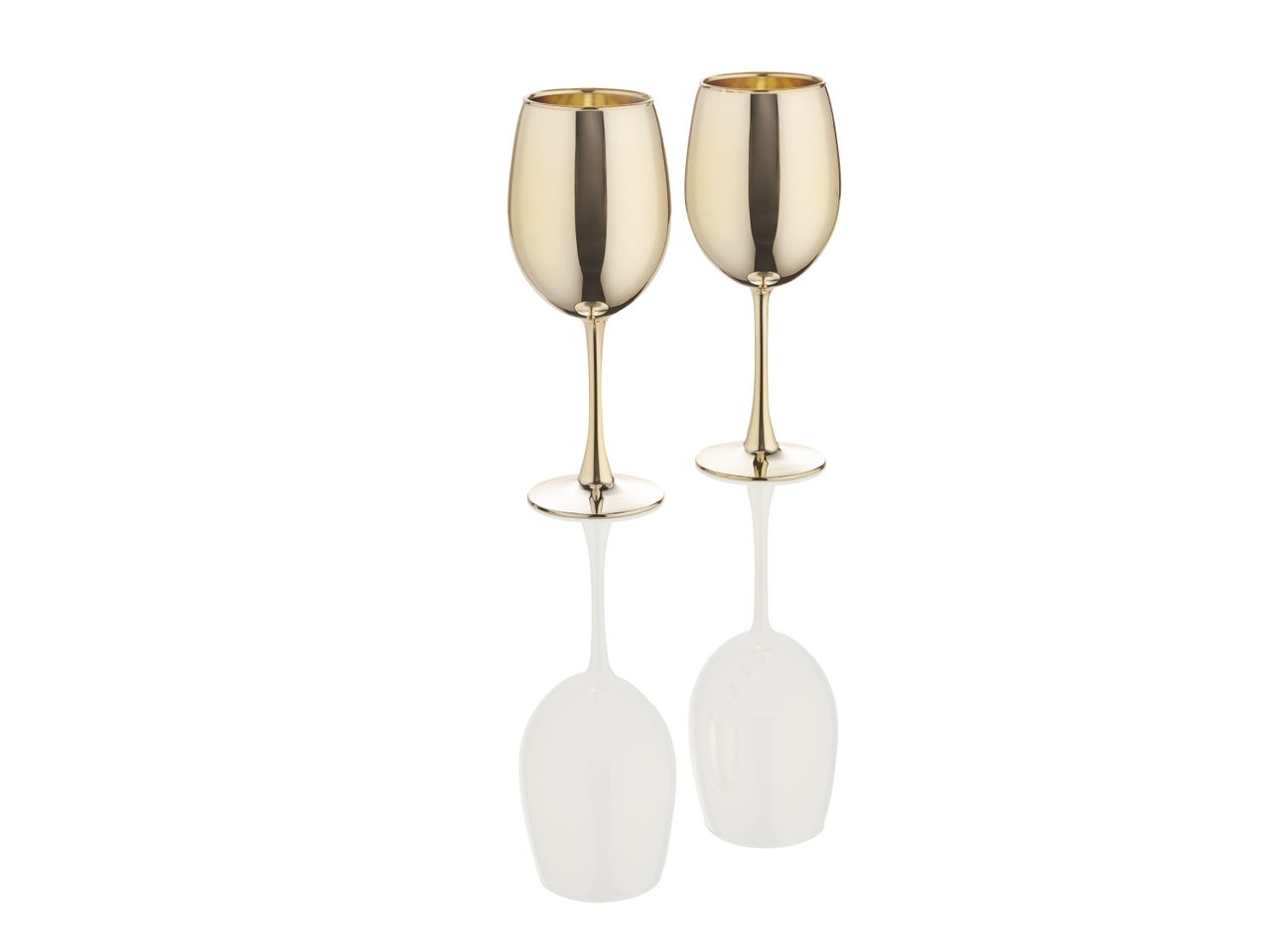 Two gold metallic wine glasses on a reflective surface.