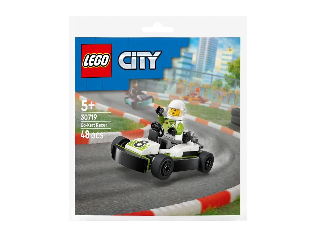 Toy go-kart racer set with a minifigure, on a race track background.