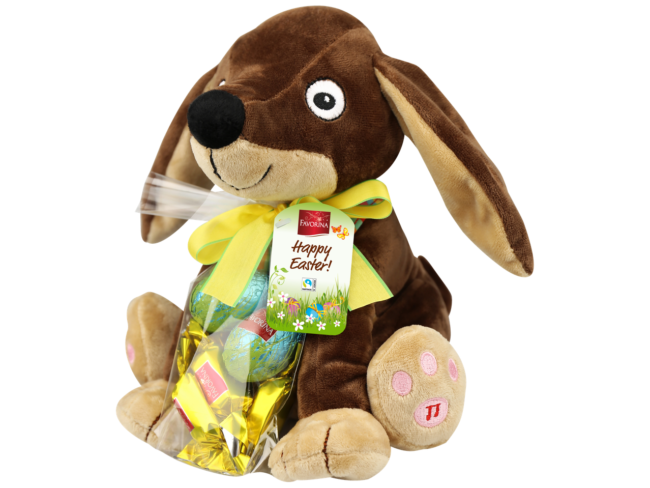 Favorina pehme pruun koerakujuline mänguasi, millel on 'Happy Easter!' silt ja šokolaadimunad.