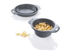 Stackable collapsible silicone bowls with pasta.