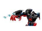 Black and red toy robot with a spider emblem, firing blue disc projectiles.