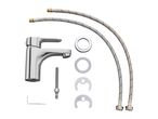 Chrome bathroom sink faucet with installation parts.