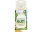 Yankee Candle Car Jar luchtverfrisser Clean Cotton, toont wasgoed drogend in de zon.