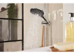 LIVARNO home Multi-Functional Shower Head spraying water in a tiled shower.