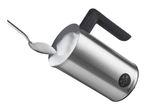 Stainless steel milk frother with a spoon of foam, tilted on a white background.