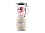Retro-style cream blender filled with berries and yogurt, featuring a 1973 logo