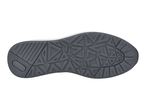 Bottom view of a dark grey shoe sole with a geometric pattern and textured grip.