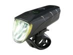 Black bicycle headlight with a clear lens and a mounting bracket, illuminated.